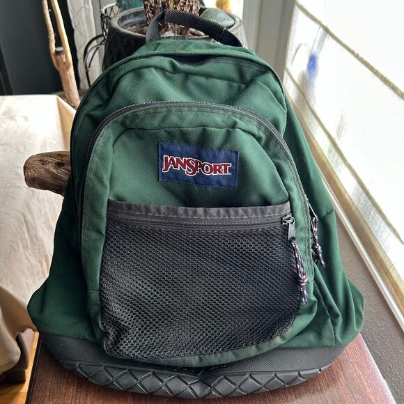 JanSport Other - Jansport backpack with a rubber base in green color school hiking